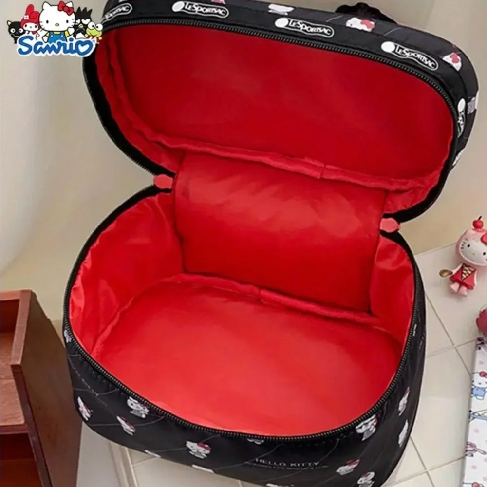 Sanrio Hello Kitty Black Cosmetic Bag with Red Bow Accent